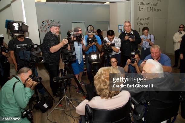 Anne Douglas and Kirk Douglas are interviewed by the media as ther arrive for the 25th Anniversary of The Anne Douglas Center at Los Angeles Mission...