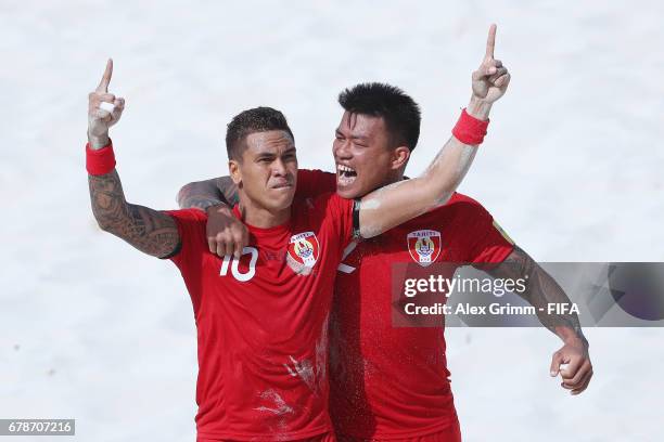 Tearii Labaste of Tahiti celebrates a goal with team mate Angelo Tchen during the FIFA Beach Soccer World Cup Bahamas 2017 quarter final match...