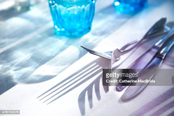 at the table - catherine macbride stock pictures, royalty-free photos & images