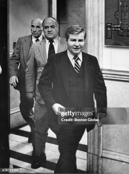 From left, Senate Majority Leader Daniel Foley, Senate Majority Whip Walter Boverini and Senate President William Bulger walk toward the Senate...