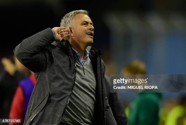 Manchester United's Portuguese coach Jose Mourinho gestures as he celebrates their opener during their UEFA Europa League semi final first leg...