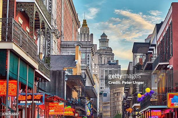 late afternoon on bourbon street,french quarter - new orleans stock pictures, royalty-free photos & images