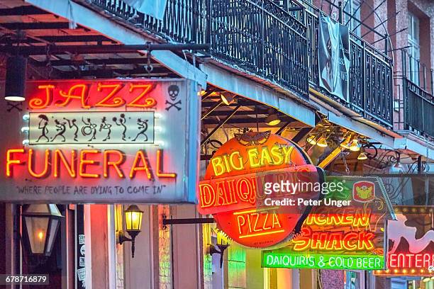 late afternoon on bourbon street,french quarter - new orleans stock pictures, royalty-free photos & images