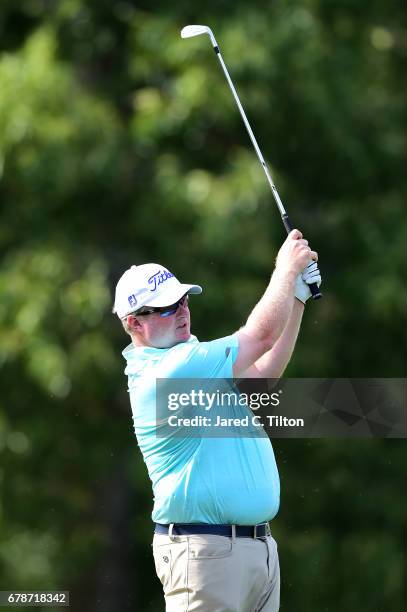 Brad Fritsch of Canada plays his shot from the second tee during round one of the Wells Fargo Championship at Eagle Point Golf Club on May 4, 2017 in...