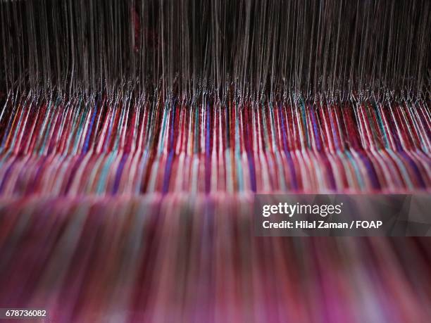view of weaving machine - webstuhl stock-fotos und bilder