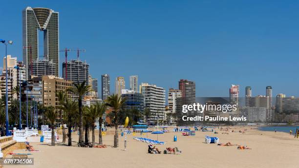 a beautiful day on poniente beach. - benidorm stock pictures, royalty-free photos & images