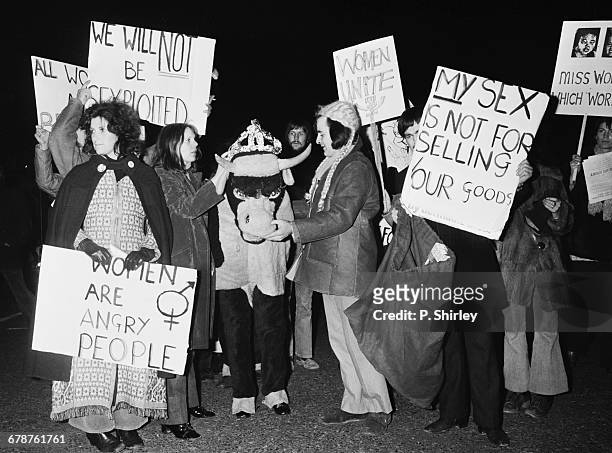 Feminist demonstrations and a pantomime cow outside the Royal Albert Hall in London, during the Miss World contest, UK, 10th November 1971.