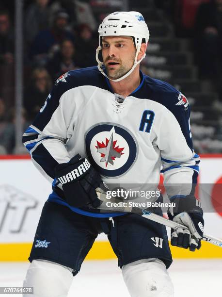 Mark Stuart of the Winnipeg Jets plays in the game against the Montreal Canadiens at Bell Centre on November 11, 2014 in Montreal, Quebec, Canada.