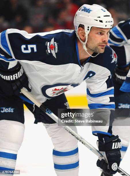 Mark Stuart of the Winnipeg Jets plays in the game against the Montreal Canadiens at Bell Centre on November 11, 2014 in Montreal, Quebec, Canada.