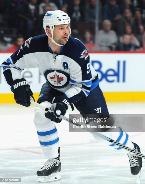 Mark Stuart of the Winnipeg Jets plays in the game against the Montreal Canadiens at Bell Centre on November 11, 2014 in Montreal, Quebec, Canada.