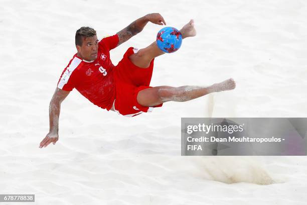 Dejan Stankovic of Switzerland attempts a scissor or bicycle kick shot on goal during the FIFA Beach Soccer World Cup Bahamas 2017 quarter final...