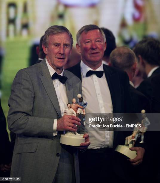 Manchester United's Youth Team manager Eric Harrison and manager Sir Alex Ferguson with their PFA Merit Award trophies