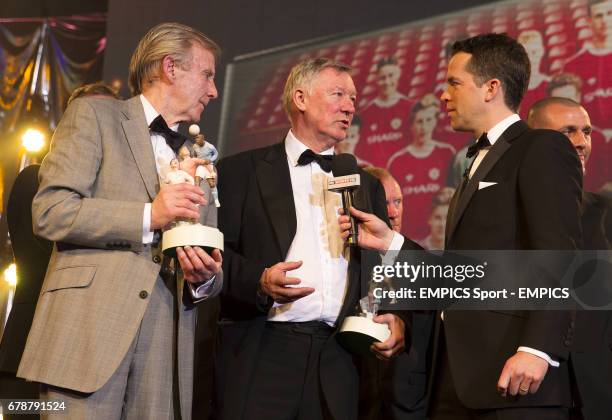 Eric Harrison and Sir Alex Ferguson speak to David Jones as they are announced winners of the PFA Merit Award for their part in the Manchester United...