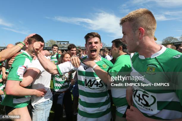 Yeovil Town goalscorer Kevin Dawson celebrates with team-mates and fans after the final whistle