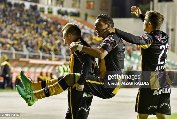 Bolivia's The Strongest player Walter Veizaga celebrates after scoring against Peru's Sporting Cristal during their Copa Libertadores match at...