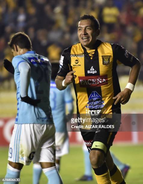 Bolivia's The Strongest player Walter Veizaga celebrates after scoring against Peru's Sporting Cristal during their Copa Libertadores match at...
