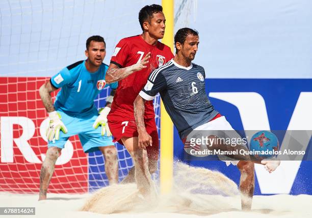 Pedro Moran of Paraguay being followed by Raimana Li Fung Kuee of Tahiti during the FIFA Beach Soccer World Cup Bahamas 2017 quarter final match...