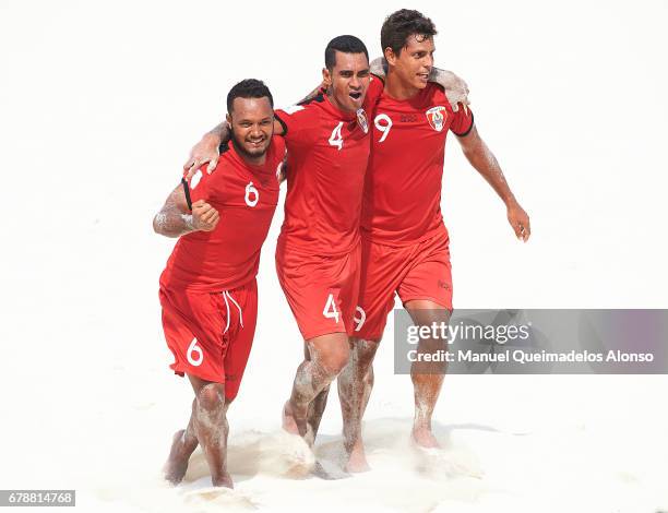 Patrick Tepa, Heimanu Taiarui and Naea Bennett of Tahiti celebrates after wining during the FIFA Beach Soccer World Cup Bahamas 2017 quarter final...