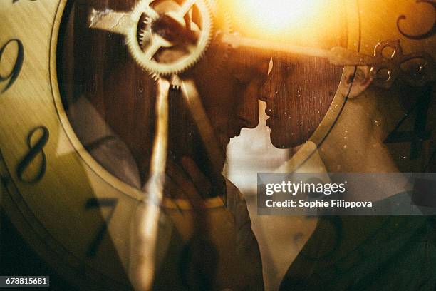 double exposure of clock and caucasian couple - time lapse clock stock pictures, royalty-free photos & images