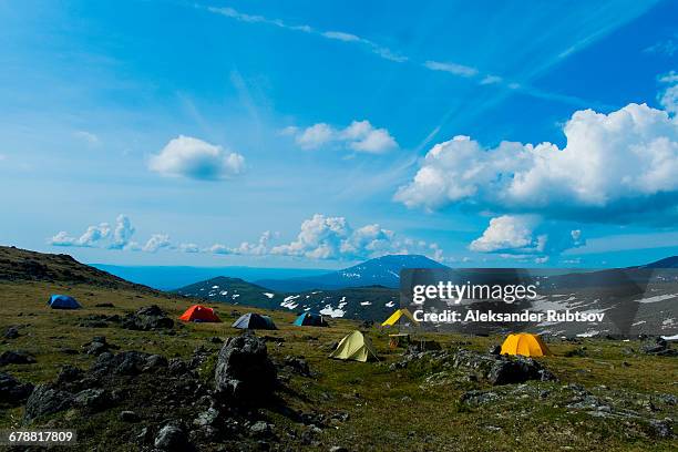 camping tents in mountain landscape - base camp stock pictures, royalty-free photos & images