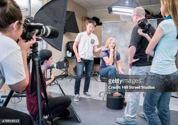 teacher and students in photography class - professional photo shoot stock pictures, royalty-free photos & images