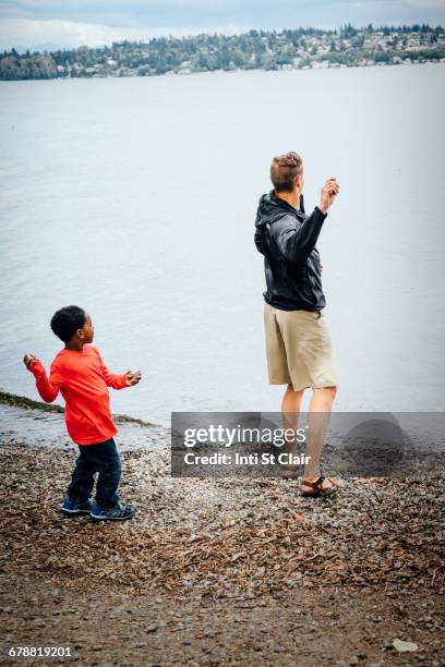 Kim Throwing Rocks 939 Kid Throwing Rocks Stock Photos, High-Res Pictures, and Images ...