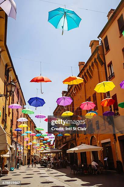 multicolor umbrellas hanging over street, bologna, emilia-romagna, italy - bologna bildbanksfoton och bilder