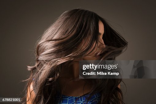 Mixed Race woman tossing hair Mixed Race woman tossing hair