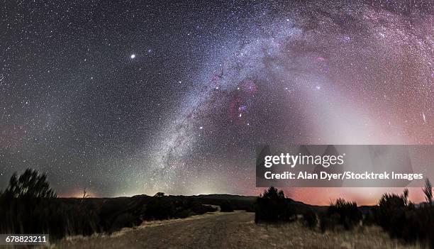 milky way, zodiacal light and other celestial objects from summit of gila national wilderness, new mexico. - zodiacal light stock pictures, royalty-free photos & images