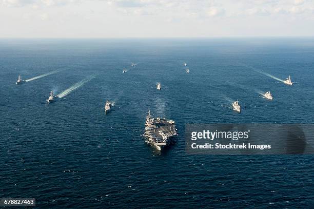 u.s. navy and rok navy ships transit the waters surrounding the korean peninsula. - korean military fotografías e imágenes de stock