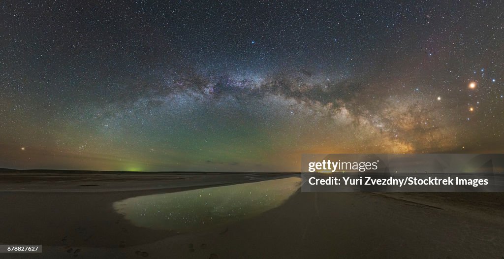 The arch of the Milky Way above Lake Elton salt lake in Russia.