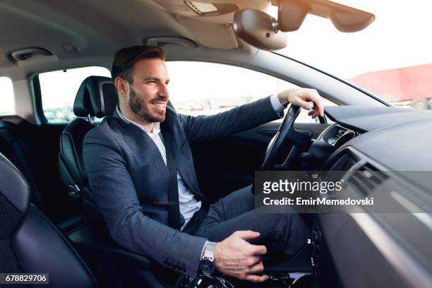 affärsman som kör bil - business man driving bildbanksfoton och bilder