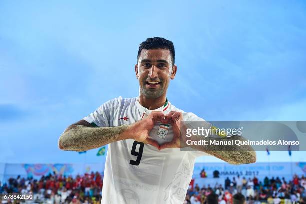 Mohammad Mokhtari of Iran celebrates after winning their match during the FIFA Beach Soccer World Cup Bahamas 2017 quarter final match between...