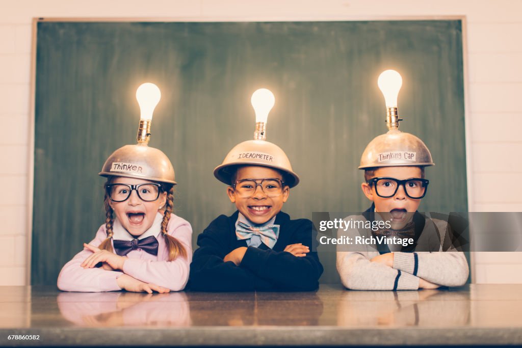 Three Young Nerds with Thinking Caps