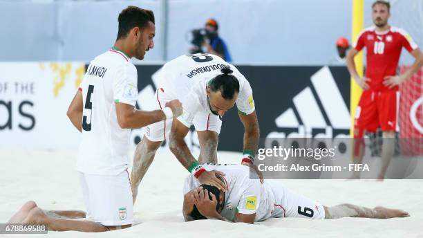 Ali Nazem of Iran celebrates a goal with team mates Mohammad Moradi and Farid Boulokbashi during the FIFA Beach Soccer World Cup Bahamas 2017 quarter...