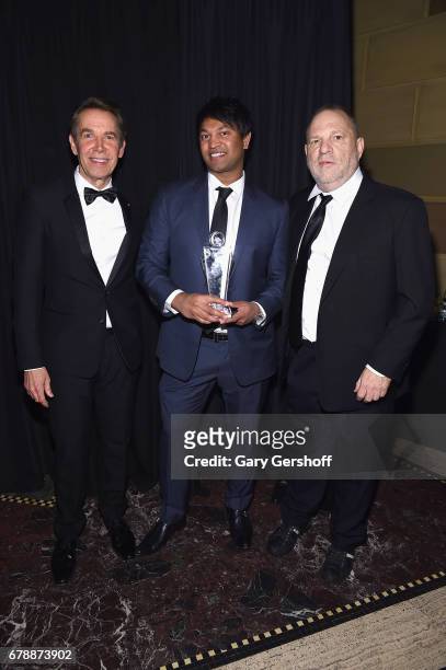 Honorary co-chair Jeff Coon poses with actor Saroo Brierley and producer Harvey Weinstein from the film "Lion", which was honored with the 2017...