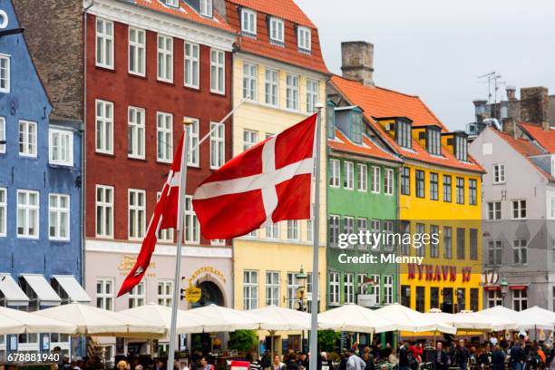 danish flags nyhavn copenhagen, denmark - danish flags stock pictures, royalty-free photos & images