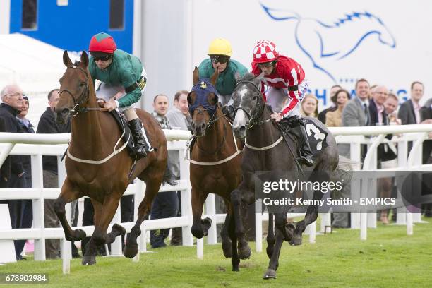 Royal Skies ridden by jockey Joe Fanning , Dorfman ridden by Adrian Nicholls and Eric The Grey ridden by Tom Eaves during the William Hill - In The...