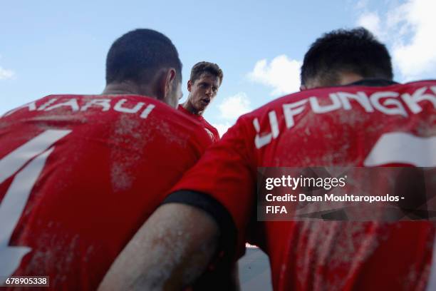 Captain, Naea Bennett of Tahati speaks to his players during the FIFA Beach Soccer World Cup Bahamas 2017 quarter final match between Paraguay and...