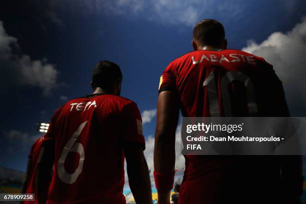 Patrick Tepa and Tearii Labaste of Tahati get ready to come on as a substitute during the FIFA Beach Soccer World Cup Bahamas 2017 quarter final...