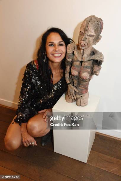 Actress/Sculptor/writer Catherine Wilkening poses with her work during "Parcours D'une Vorace" Catherine Wilkening Sculptures Exhibition Preview and...