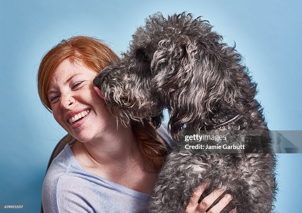 Red headed British female with her dog