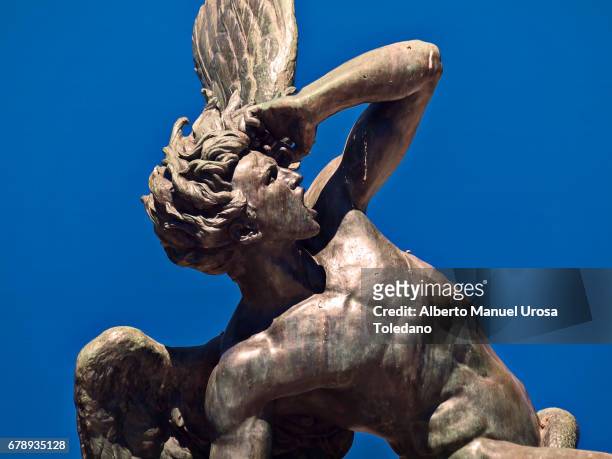 spain,madrid, retiro park, fountain of the fallen angel - lost angels stock pictures, royalty-free photos & images