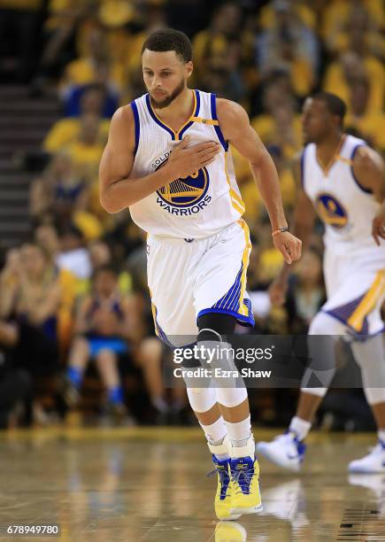 Stephen Curry of the Golden State Warriors reacts against the Utah Jazz during Game Two of the NBA Western Conference Semi-Finals at ORACLE Arena on...