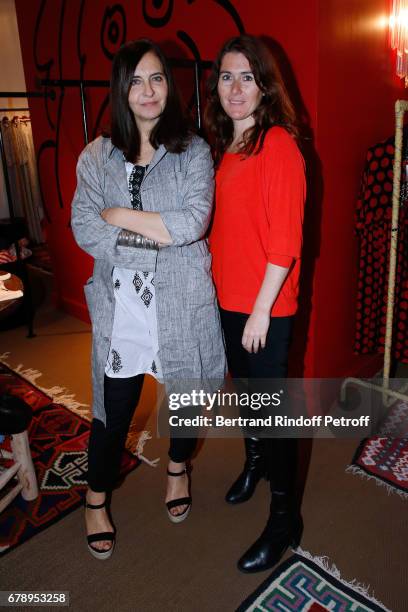 Nathalie Garcon and wife of pascal Legitimus, Adriana Santini attend the Cocktail "Art is doing well", "L'art se porte bien", Exhibition of the...
