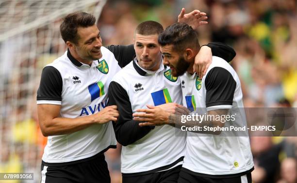 Norwich City's Bradley Johnson celebrates his goal with Russell Martin and Gary Hooper