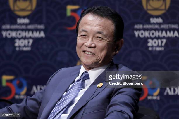 Taro Aso, Japan's deputy prime minister and finance minister, attends the 50th Asian Development Bank Annual Meeting in Yokohama, Japan, on Friday,...