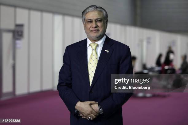 Mohammad Ishaq Dar, Pakistan's finance minister, poses for a photograph following a Bloomberg Television interview on the sidelines of the 50th Asian...