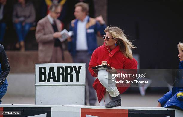 Stephanie McLean, wife of British racing motorcyclist Barry Sheene next to a sign bearing her husband's name, during the XIV TransAtlantic Challenge...
