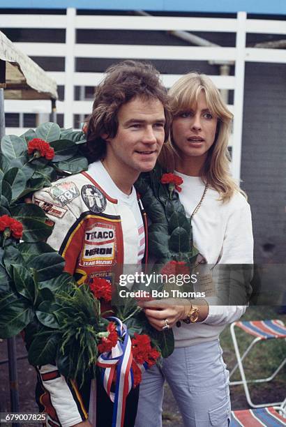 British racing motorcyclist Barry Sheene with his girlfriend Stephanie McLean at the International Motor Cycle Races, Oulton Park, Cheshire, 28th...